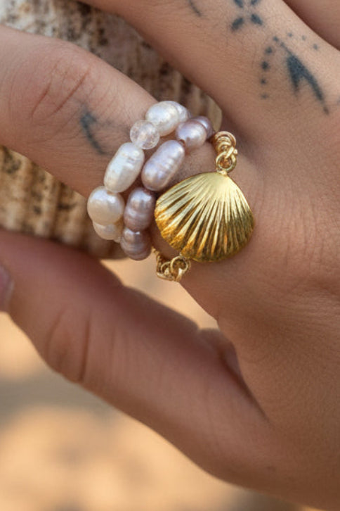 Golden shell pearl ring outdoor shot