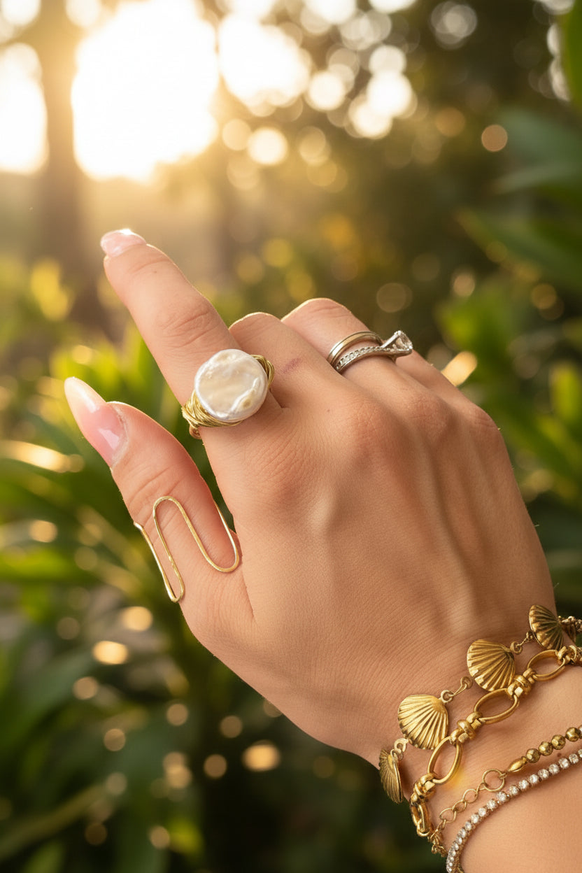 Coin pearl ring with gold wire wrap close up