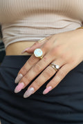Handmade coin pearl ring worn on hand
