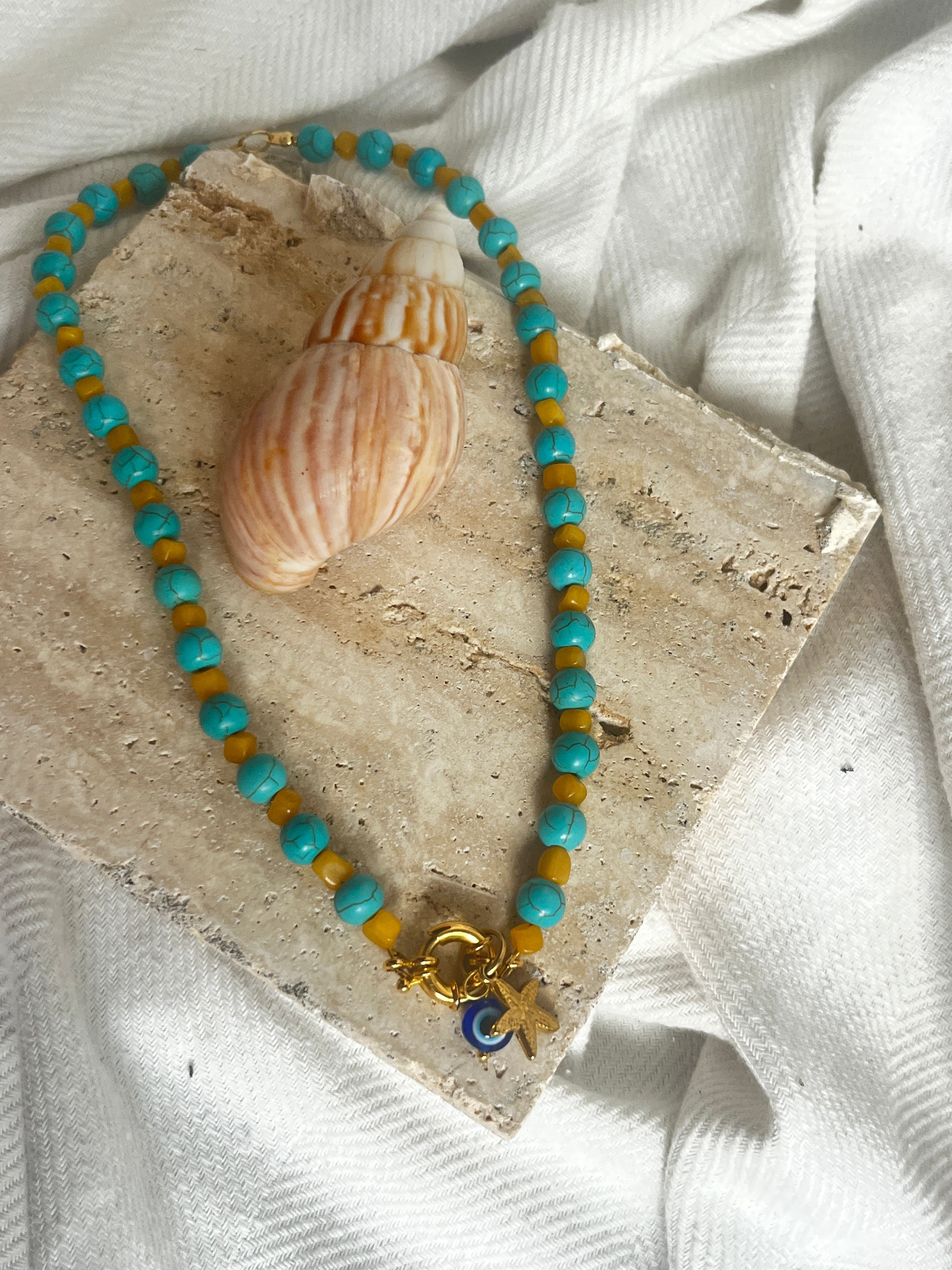 Summer Bliss – Handmade Turquoise Beaded Necklace with Gold Starfish & Evil Eye Charm - Sirena Jewelry